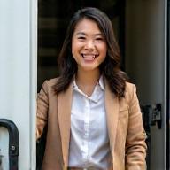 Sophia Chen stepping out of the mobile grooming van